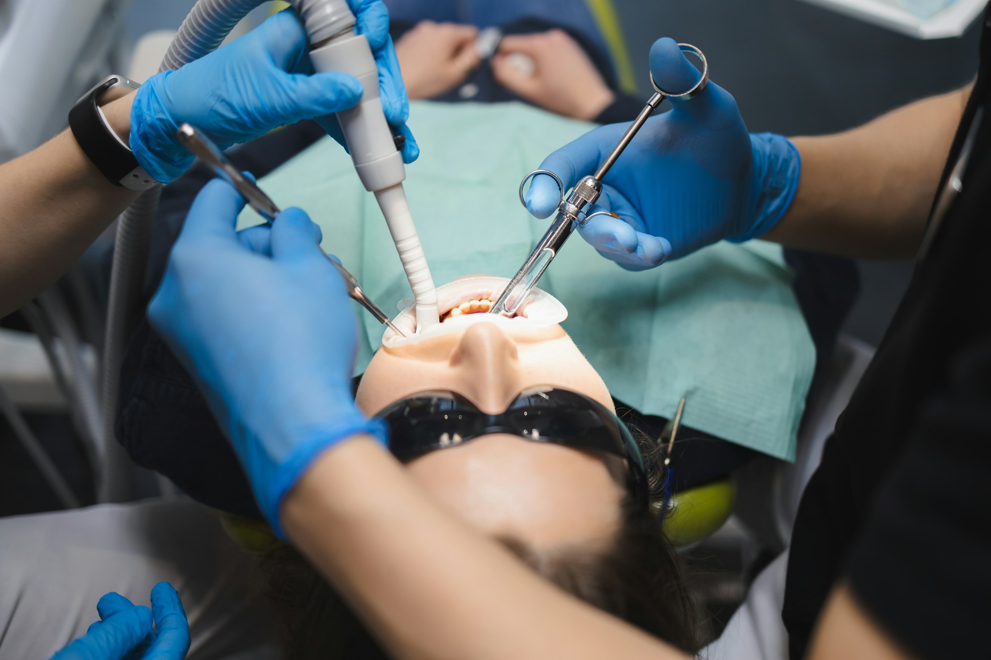 Doctor giving anesthesia to the patient before dental surgery